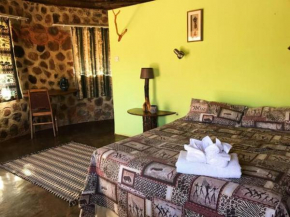 Charming Bush chalet 4 on this world renowned Eco site 40 minutes from Vic Falls Non Catered - 1990